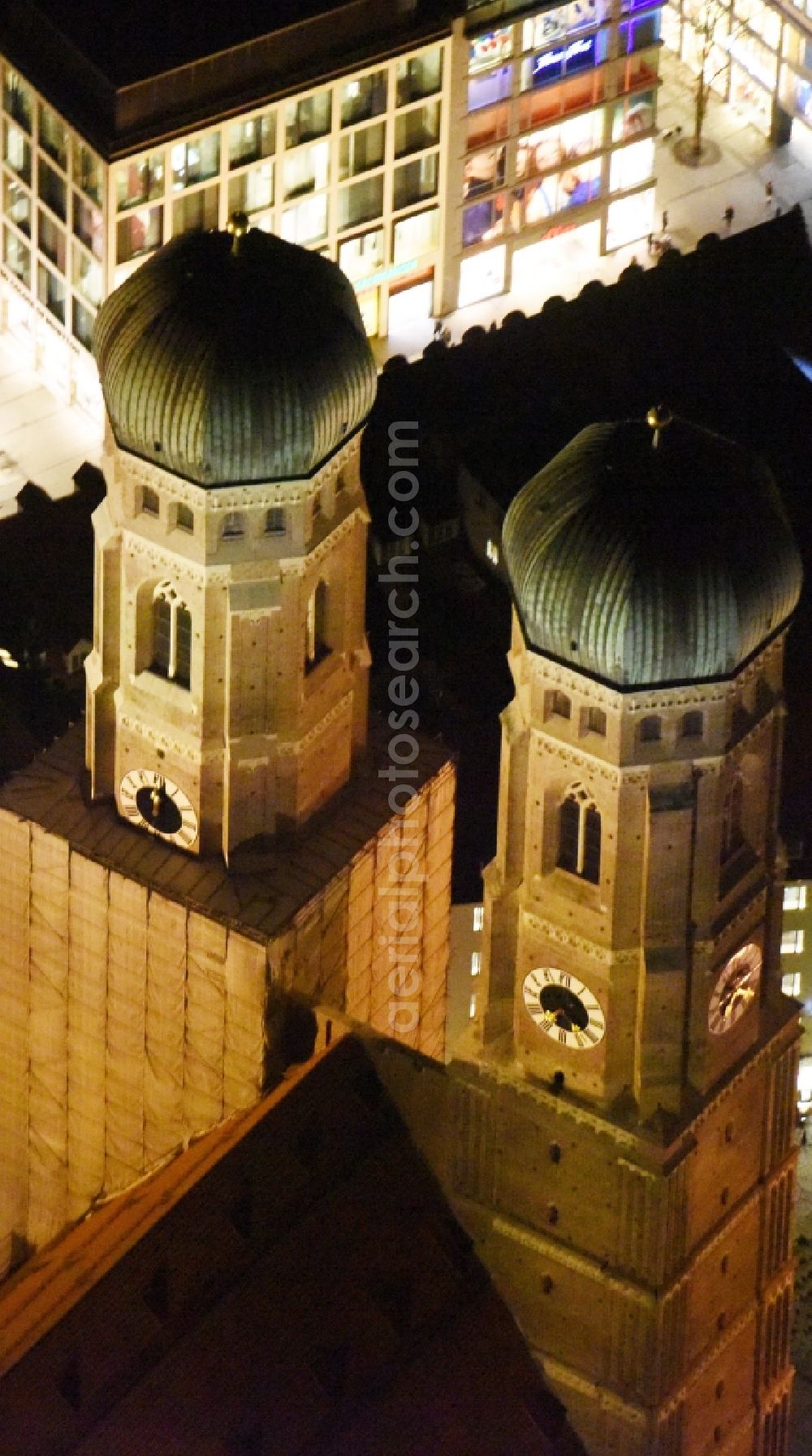 Aerial image at night München - City view of the Old Town at the Frauenkirche at the New Town Hall in the center of Munich in Bavaria