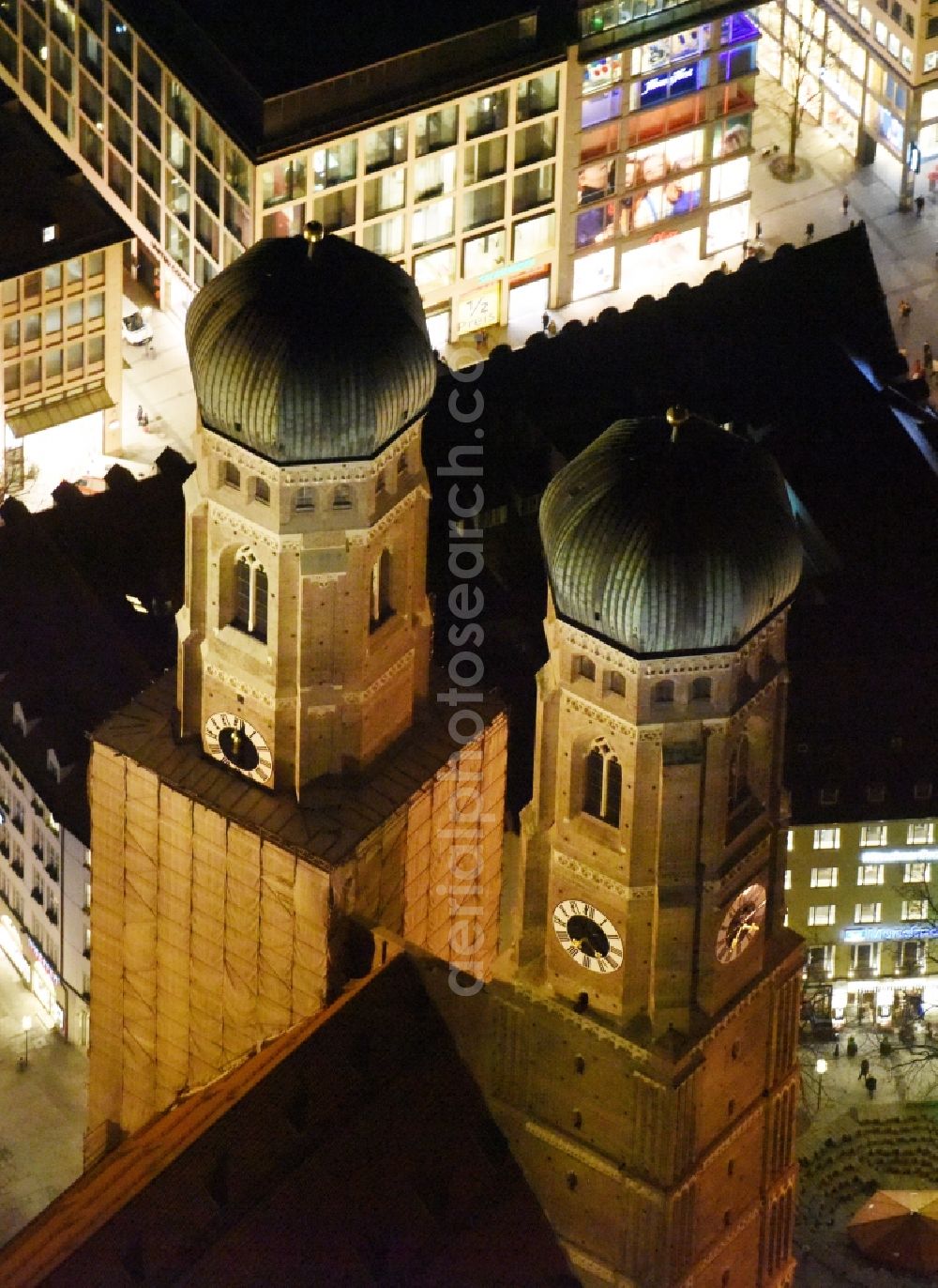 München at night from the bird perspective: City view of the Old Town at the Frauenkirche at the New Town Hall in the center of Munich in Bavaria