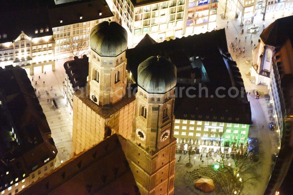 Aerial photograph at night München - City view of the Old Town at the Frauenkirche at the New Town Hall in the center of Munich in Bavaria