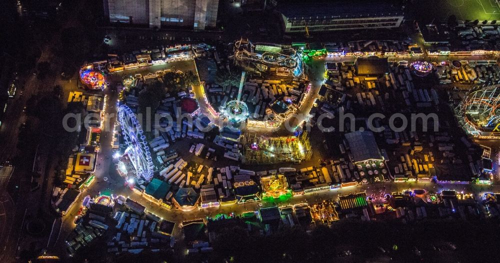 Hamburg at night from the bird perspective: Night aerial view of the festival - event in Hamburger Dom in Hamburg