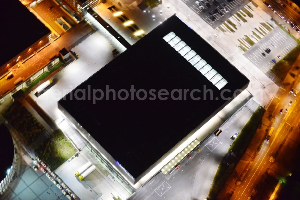 Berlin at night from the bird perspective: Night aerial view of the Exhibition Venue City Cube at the exhibition grounds in Berlin Charlottenburg