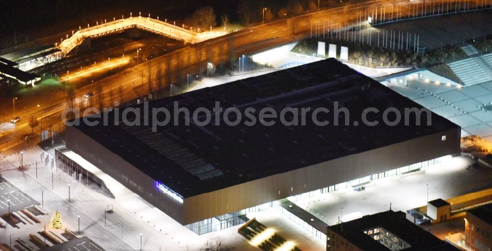 Berlin at night from the bird perspective: Night aerial view of the exhibition Venue CityCube at the exhibition grounds in Berlin Charlottenburg