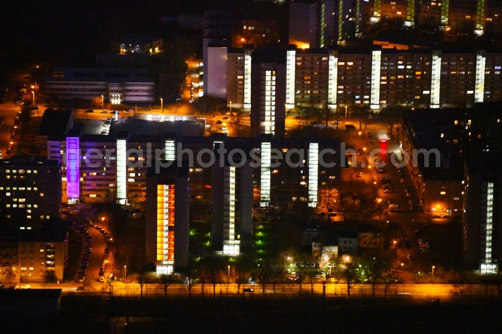 Aerial image at night Dresden - Night lighting Skyscrapers in the residential area of industrially manufactured settlement entlang of Kaethe-Kollwitz-Ufer in the district Altstadt in Dresden in the state Saxony, Germany