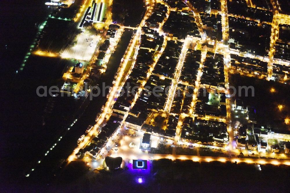 Rostock at night from the bird perspective: Night view city view of the city area of in the district Seebad Warnemuende in Rostock in the state Mecklenburg - Western Pomerania