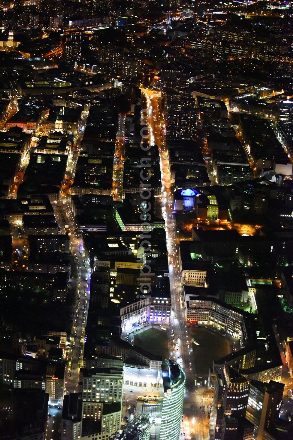 Berlin at night from the bird perspective: Night view of the street guide of famous promenade and shopping street Leipziger Strasse in Berlin