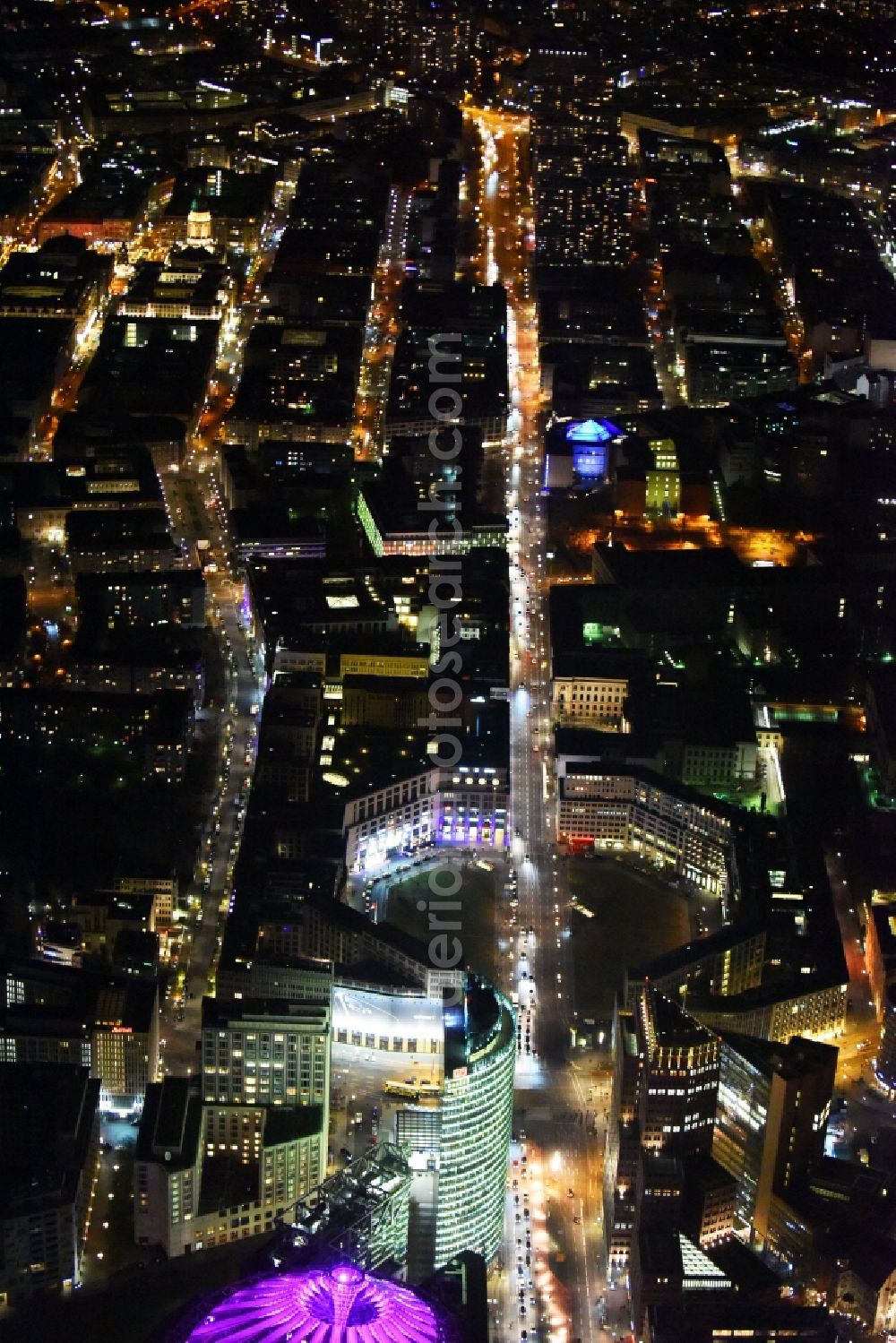 Aerial photograph at night Berlin - Night view of the street guide of famous promenade and shopping street Leipziger Strasse in Berlin