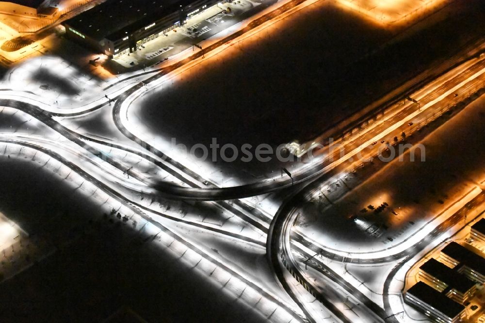 Aerial image at night Schönefeld - Night light image of the differently bright street lighting terminal at the new BER / BBI airport BERLIN BRANDENBURG AIRPORT Willi Brandt in Schoenefeld, Brandenburg