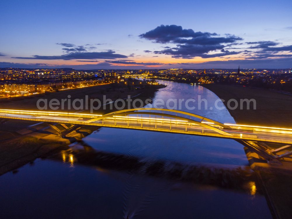 Dresden at night from the bird perspective: Night lighting night lighting Waldschloesschenbruecke on the shore of the river Elbe in Dresden in Saxony