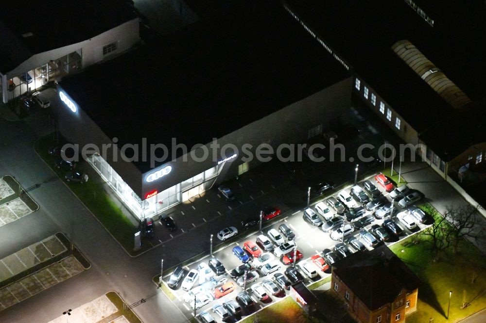 Aerial image at night Arnstadt - Night lighting Car dealership building Ehrhardt AG Audi Arnstadt in of Ichtershaeuser Strasse in Arnstadt in the state Thuringia, Germany