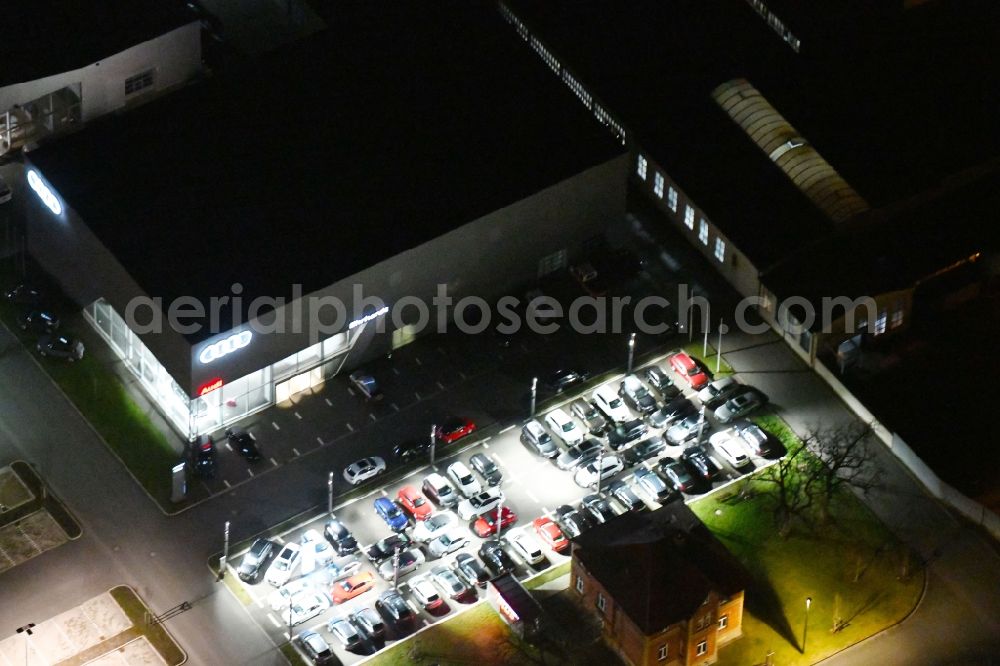 Arnstadt at night from above - Night lighting Car dealership building Ehrhardt AG Audi Arnstadt in of Ichtershaeuser Strasse in Arnstadt in the state Thuringia, Germany