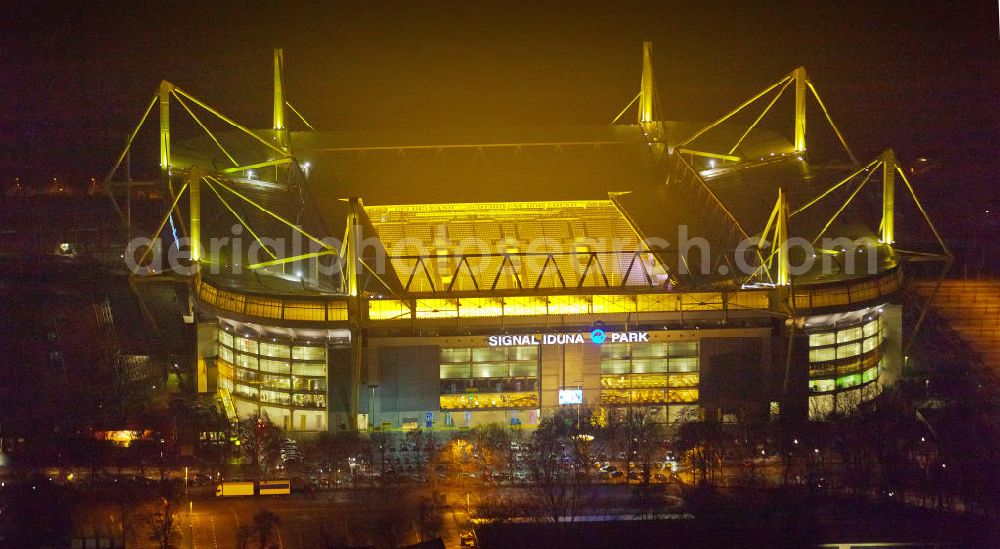 Dortmund at night from the bird perspective: Nachtluftbild des Borusseum , dem Stadion Signal Iduna Park des BVB. Night shot aerial of Borusseum, the Signal Iduna Park stadium of Borussia Dortmund.