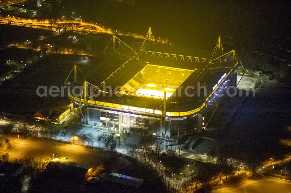 Dortmund at night from the bird perspective: Night shot of Borusseum, the Signal Iduna Park stadium of Borussia Dortmund