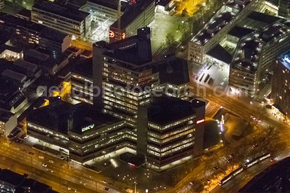 KÖLN at night from above - Night aerial view of the office building of the administration of insurance DKV and ERGO in Cologne in North Rhine-Westphalia NRW