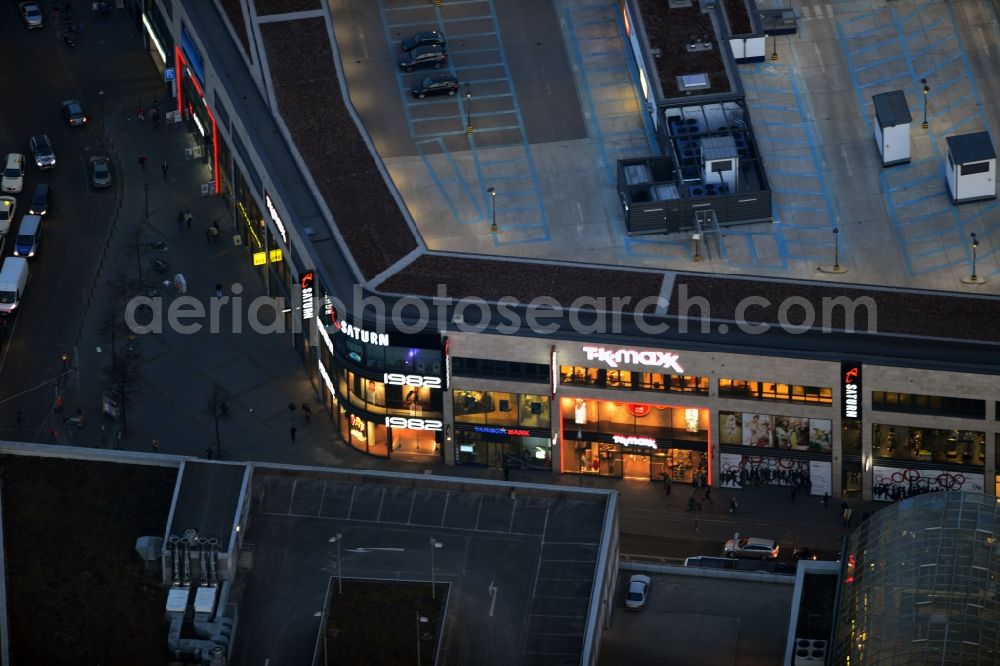 Berlin at night from the bird perspective: View of shopping center on Elcknerplatz at Berlin - Köpenick