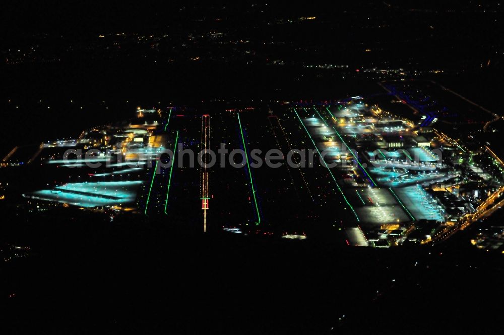 Aerial photograph at night Frankfurt am Main - Night view of Runway with hangar taxiways and terminals on the grounds of the airport in Frankfurt in the state Hesse