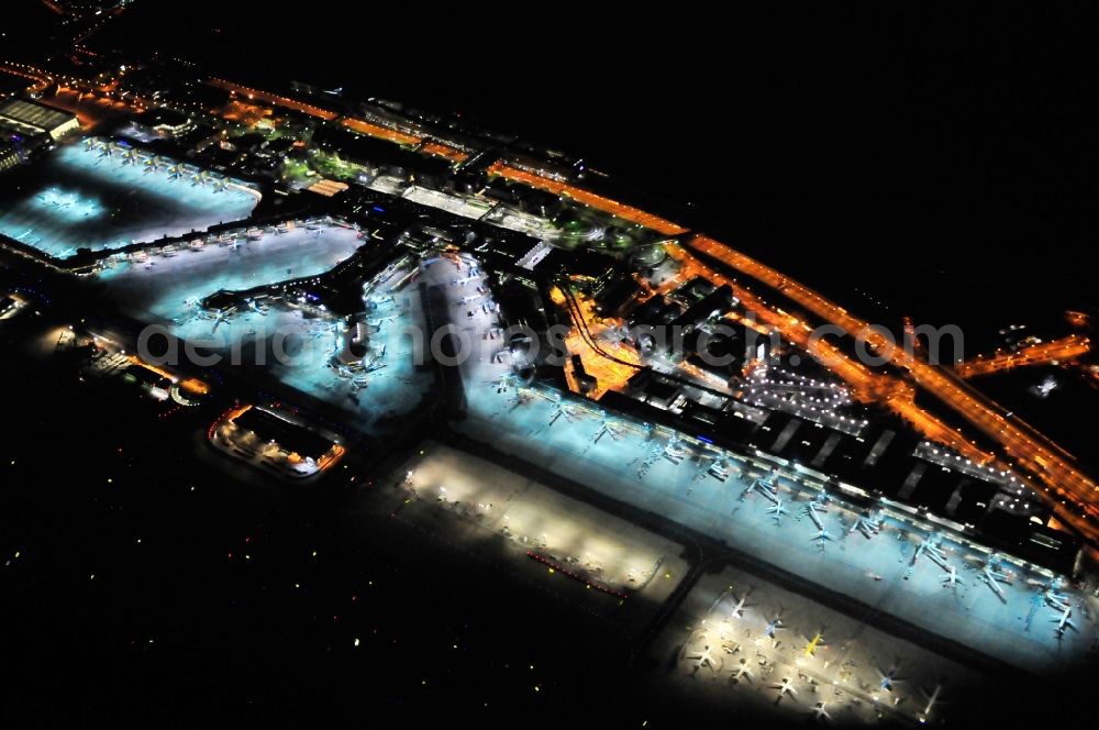 Aerial photograph at night Frankfurt am Main - Night view of Runway with hangar taxiways and terminals on the grounds of the airport in Frankfurt in the state Hesse