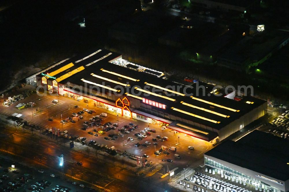 Barsbüttel at night from above - Night lighting building of the construction market BAUHAUS Barsbuettel on Rahlstedter Strasse in Barsbuettel in the state Schleswig-Holstein, Germany