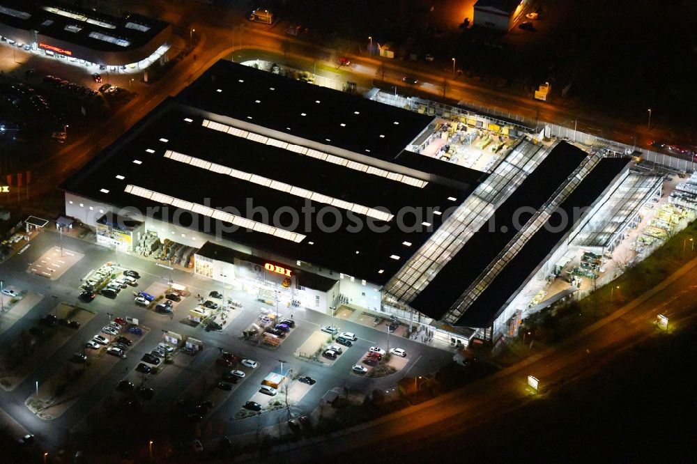 Erfurt at night from above - Night lighting Building of the construction market OBI Markt Erfurt Sued in of Holzlandstrasse in Erfurt in the state Thuringia, Germany