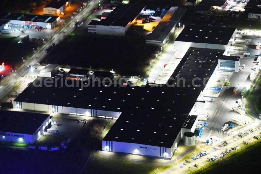 Aerial image at night Gotha - Night lighting Building complex and grounds of the logistics center of Kraftverkehr Nagel GmbH & Co. KG in of Kurt-Nagel-Strasse in Gotha in the state Thuringia, Germany