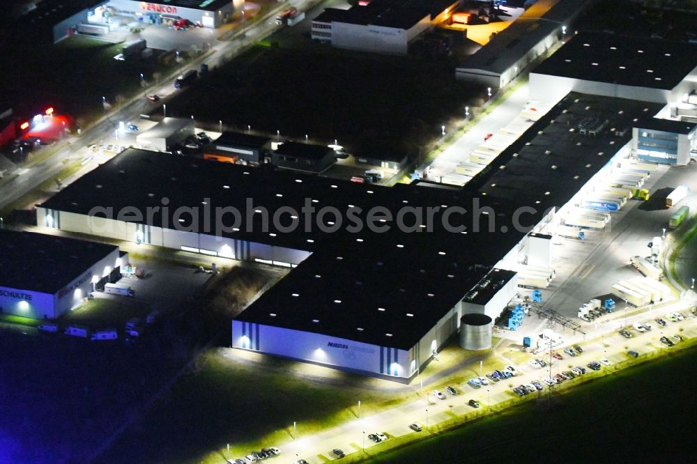 Gotha at night from above - Night lighting Building complex and grounds of the logistics center of Kraftverkehr Nagel GmbH & Co. KG in of Kurt-Nagel-Strasse in Gotha in the state Thuringia, Germany