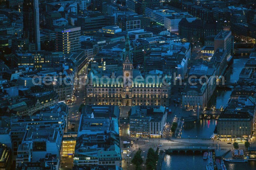 Aerial image at night Hamburg - Nigt view of The City Hall is the seat of citizenship ( Parliament ) and the Senate ( Government ) of the Free and Hanseatic City of Hamburg. The town hall is part of the North German Renaissance style