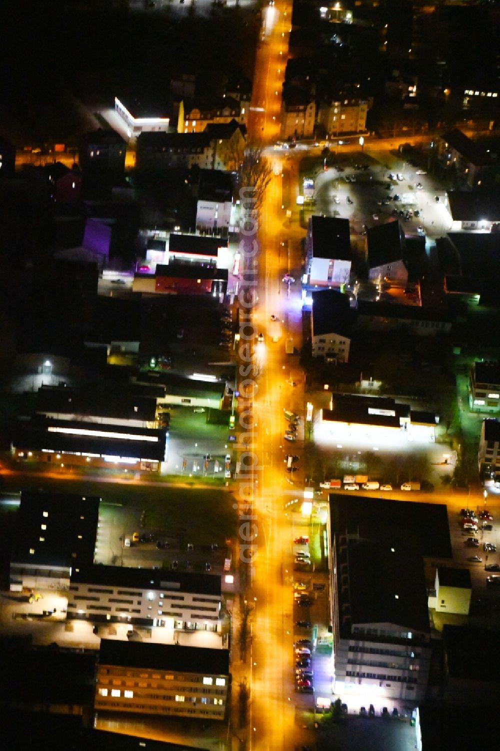 Aerial image at night Weimar - Night lighting Industrial estate and company settlement along the Riessnerstrasse in Weimar in the state Thuringia, Germany