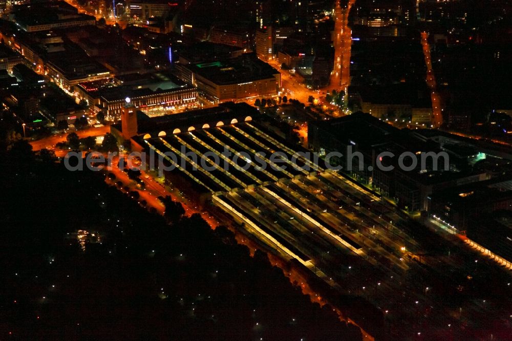 Aerial photograph at night Stuttgart - Night lighting track progress and building of the main station of the railway in Stuttgart in the state Baden-Wurttemberg, Germany