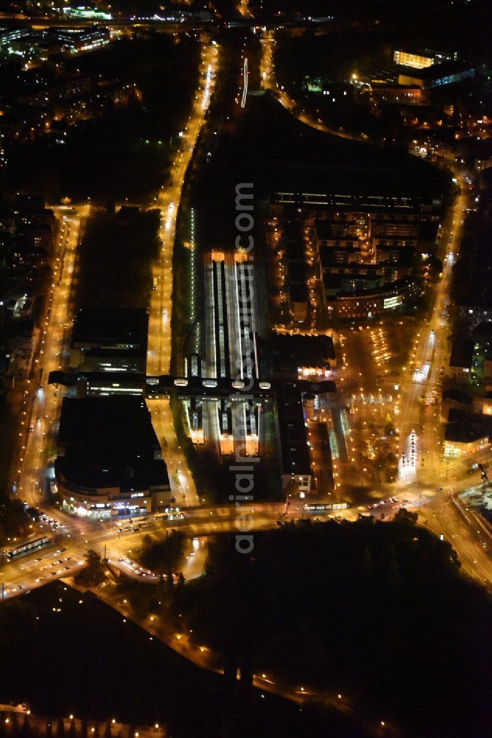 Potsdam at night from the bird perspective: Night image of the main station of the railway in Potsdam in the state of Brandenburg