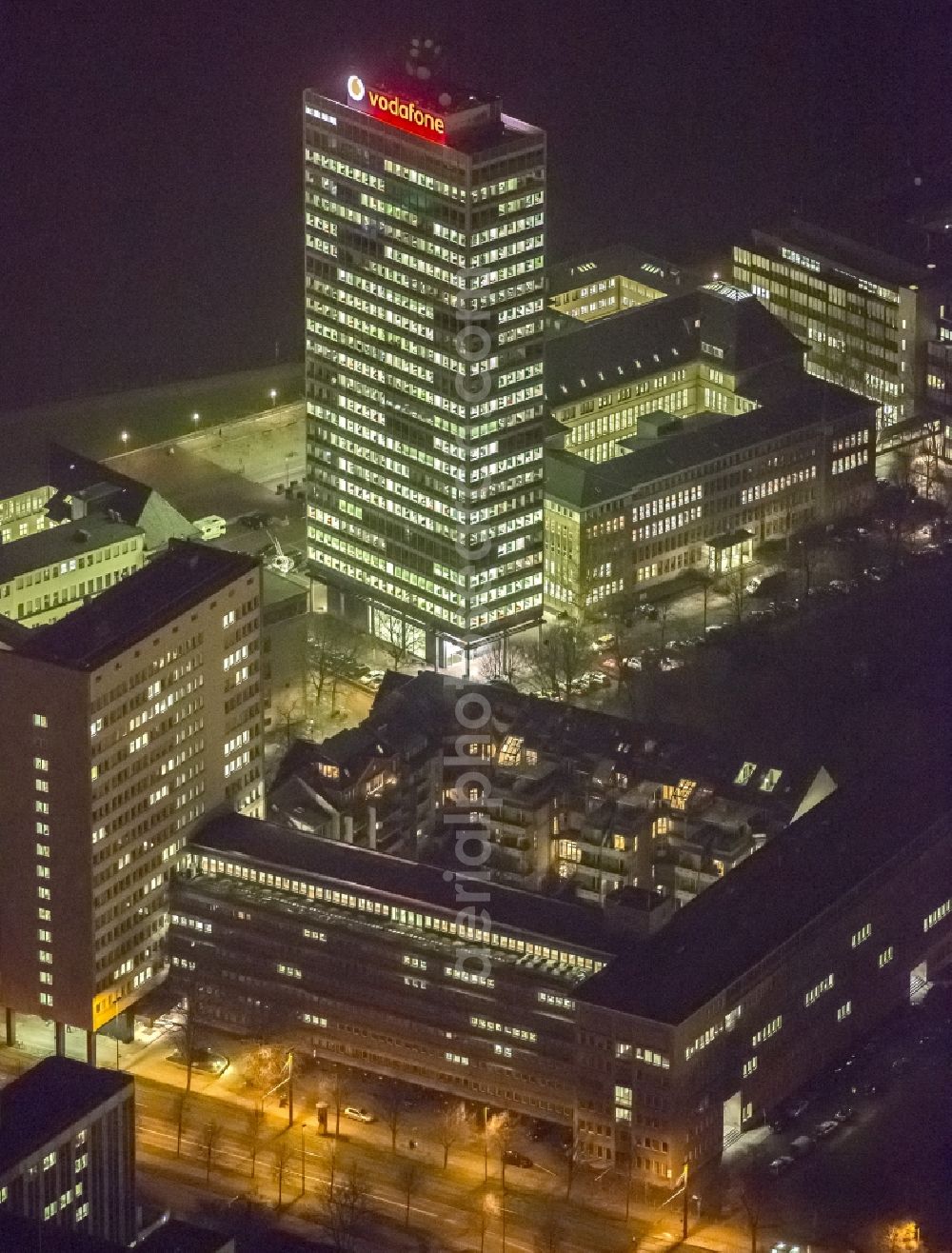 Aerial image at night Düsseldorf - Night aerial view of the building of the European headquarters of the telecommunications Konzernes Vodafone on the Rhine in Dusseldorf in North Rhine-Westphalia