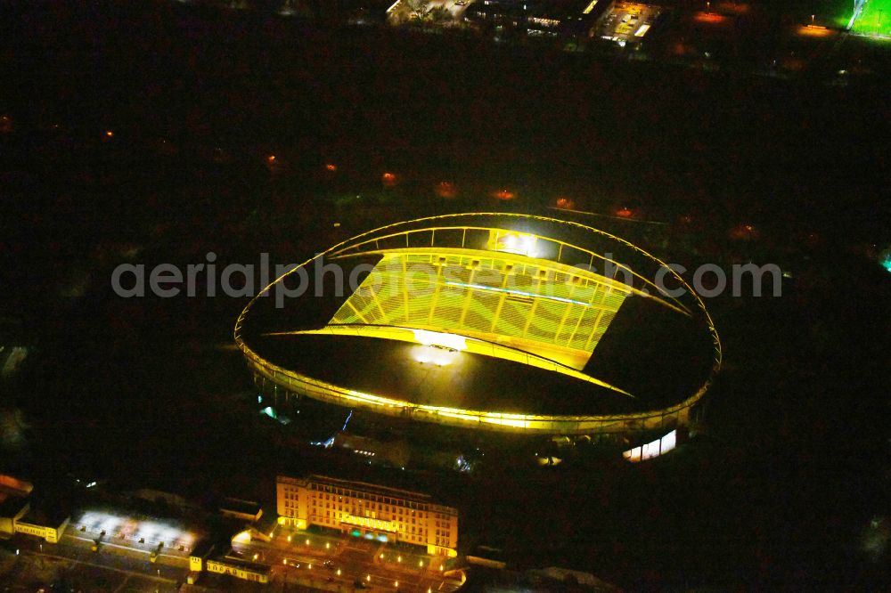 Aerial photograph at night Leipzig - Night lighting on the sports ground of the stadium Red Bull Arena Am Sportforum in Leipzig in the state Saxony, Germany