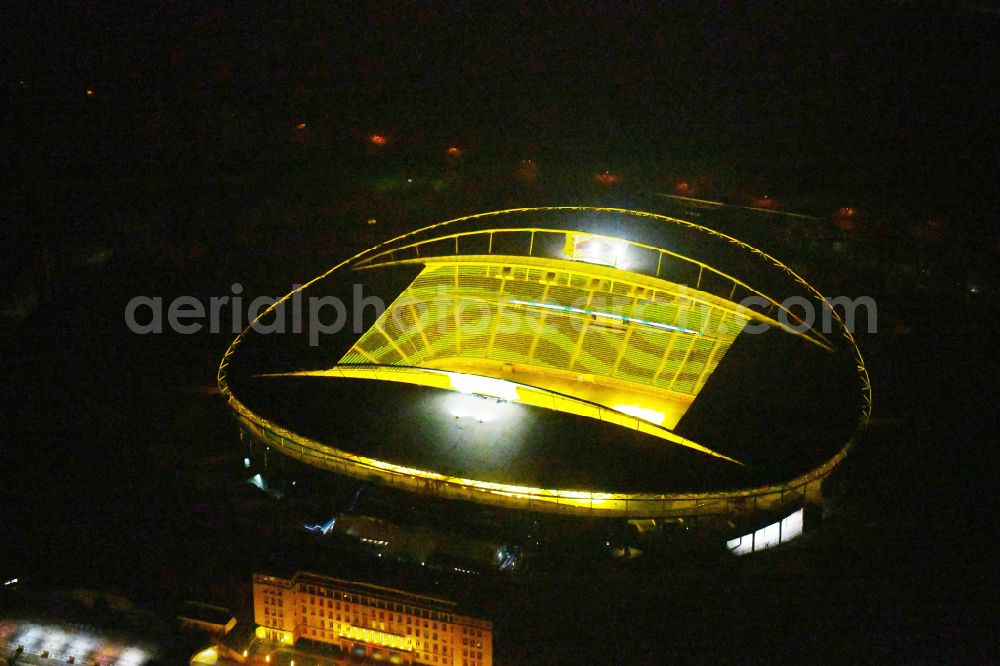 Aerial image at night Leipzig - Night lighting on the sports ground of the stadium Red Bull Arena Am Sportforum in Leipzig in the state Saxony, Germany