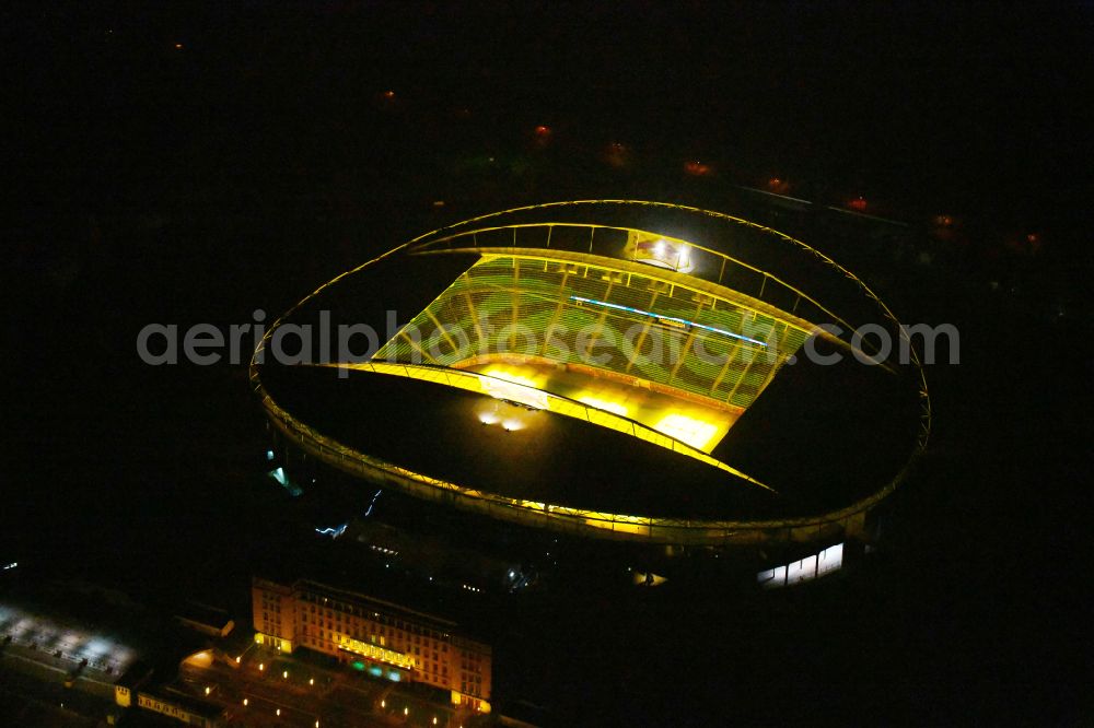 Leipzig at night from above - Night lighting on the sports ground of the stadium Red Bull Arena Am Sportforum in Leipzig in the state Saxony, Germany