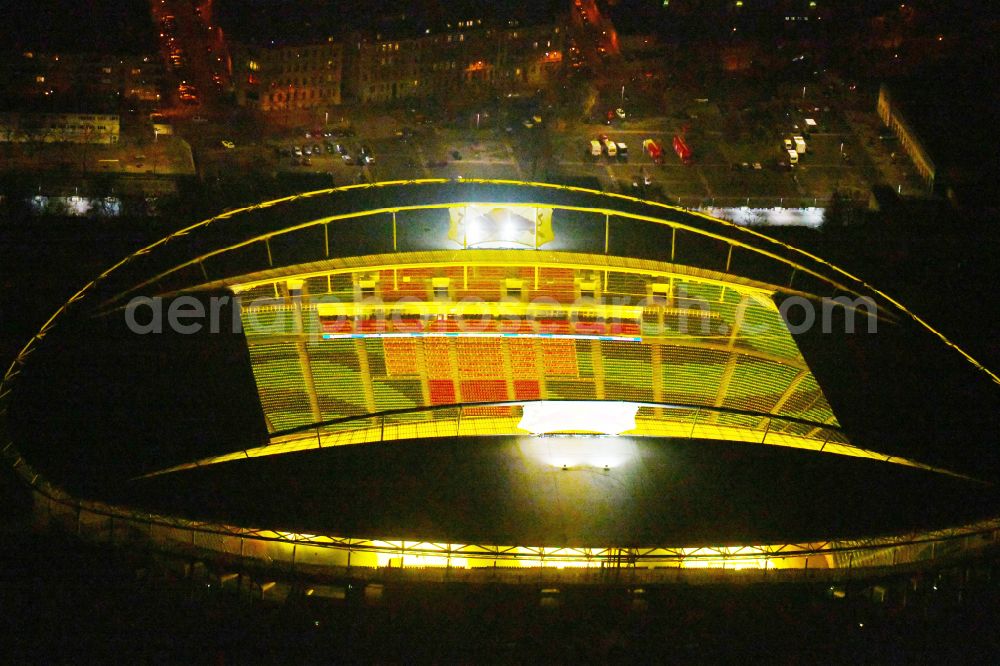 Leipzig at night from above - Night lighting on the sports ground of the stadium Red Bull Arena Am Sportforum in Leipzig in the state Saxony, Germany