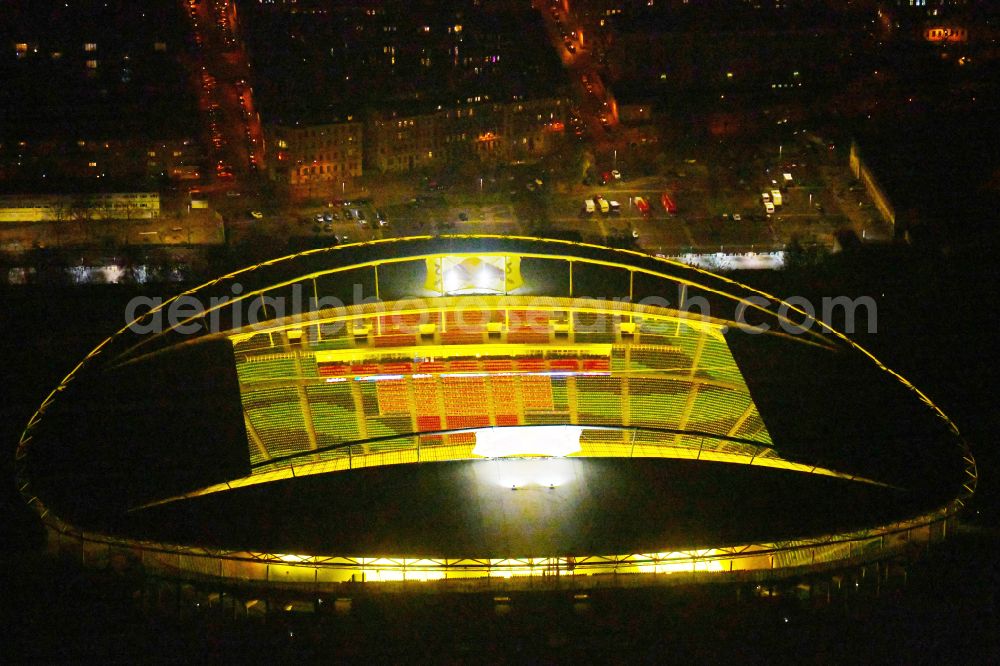 Leipzig at night from the bird perspective: Night lighting on the sports ground of the stadium Red Bull Arena Am Sportforum in Leipzig in the state Saxony, Germany