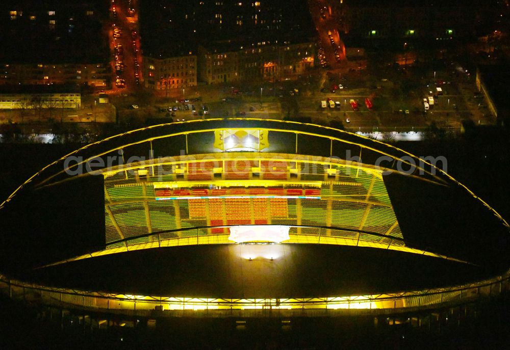 Aerial photograph at night Leipzig - Night lighting on the sports ground of the stadium Red Bull Arena Am Sportforum in Leipzig in the state Saxony, Germany