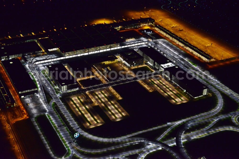 Schönefeld at night from the bird perspective: Site of the new airport BER / BBI AIRPORT BERLIN BRANDENBURG Willi Brandt in Schoenefeld in Brandenburg. The new terminal is in the south of the airport Berlin -Schoenefeld quality built