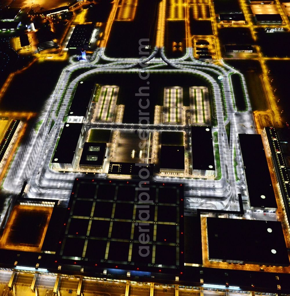 Schönefeld at night from the bird perspective: Site of the new airport BER / BBI AIRPORT BERLIN BRANDENBURG Willi Brandt in Schoenefeld in Brandenburg. The new terminal is in the south of the airport Berlin -Schoenefeld quality built