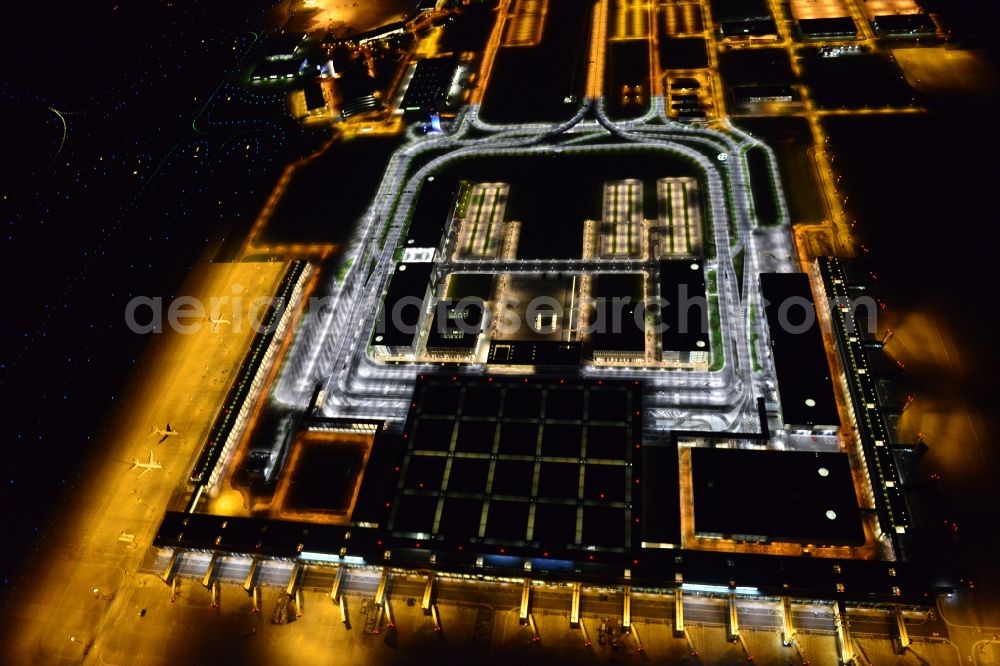 Aerial photograph at night Schönefeld - Site of the new airport BER / BBI AIRPORT BERLIN BRANDENBURG Willi Brandt in Schoenefeld in Brandenburg. The new terminal is in the south of the airport Berlin -Schoenefeld quality built