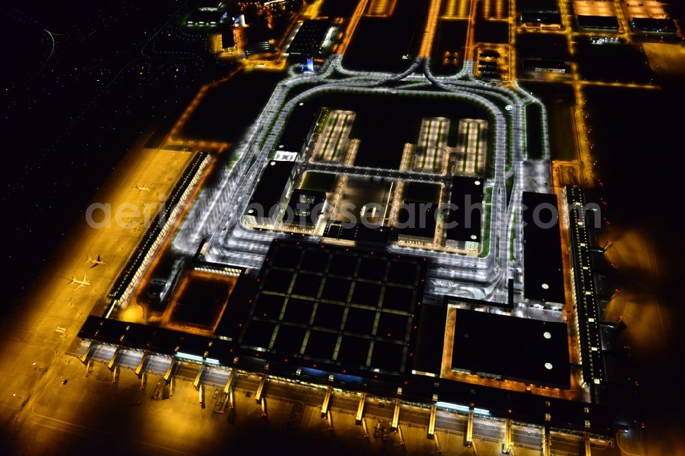 Aerial image at night Schönefeld - Site of the new airport BER / BBI AIRPORT BERLIN BRANDENBURG Willi Brandt in Schoenefeld in Brandenburg. The new terminal is in the south of the airport Berlin -Schoenefeld quality built