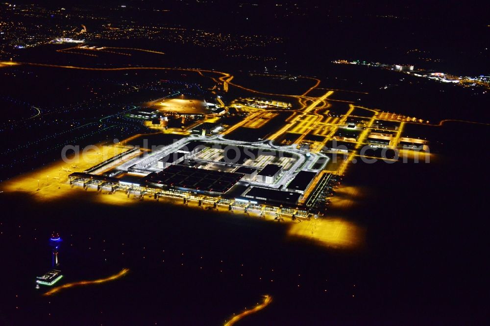 Schönefeld at night from the bird perspective: Site of the new airport BER / BBI AIRPORT BERLIN BRANDENBURG Willi Brandt in Schoenefeld in Brandenburg. The new terminal is in the south of the airport Berlin -Schoenefeld quality built