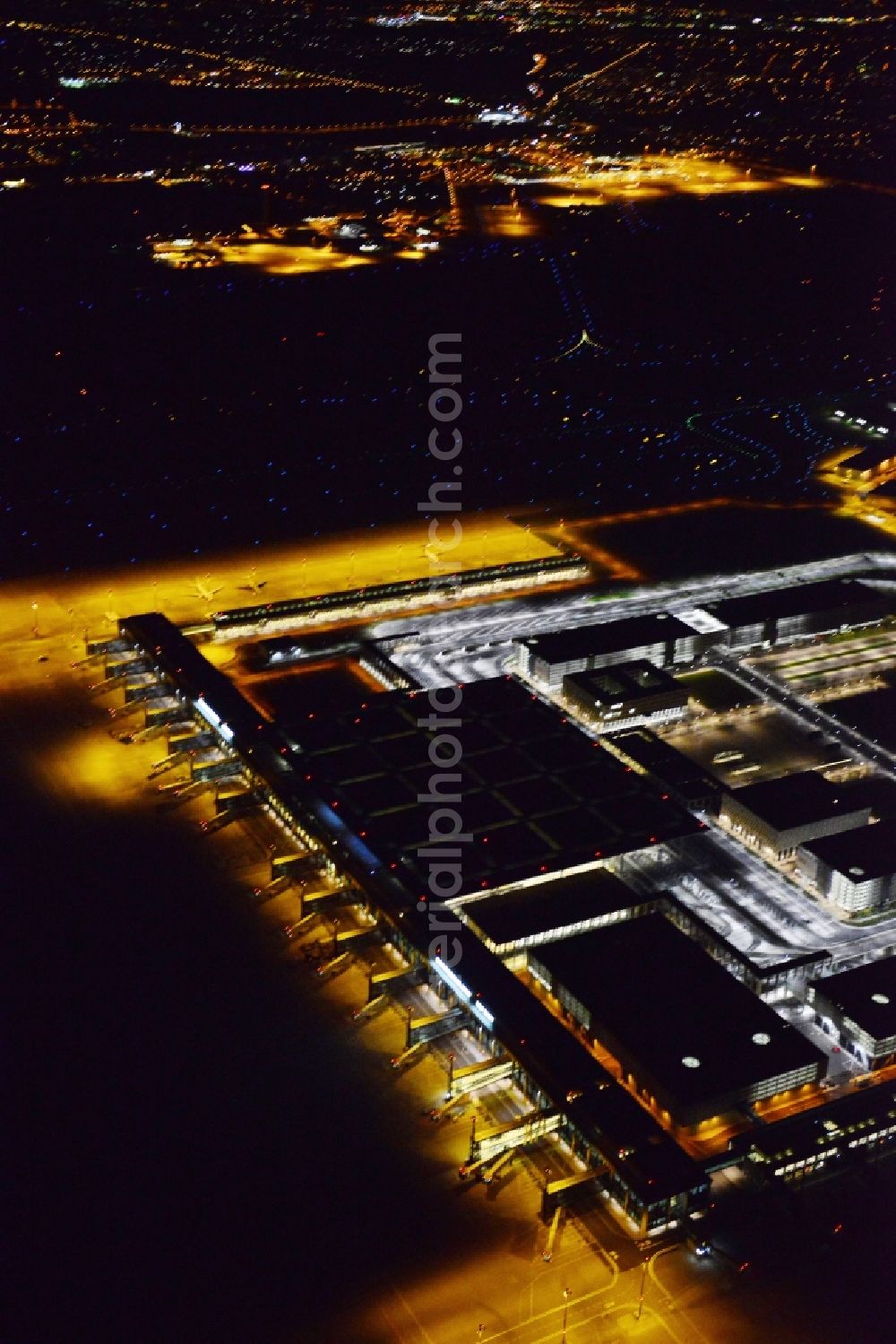 Schönefeld at night from above - Site of the new airport BER / BBI AIRPORT BERLIN BRANDENBURG Willi Brandt in Schoenefeld in Brandenburg. The new terminal is in the south of the airport Berlin -Schoenefeld quality built