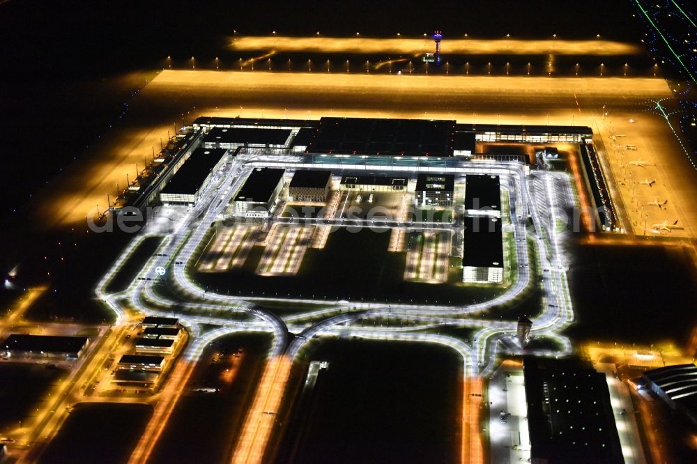 Schönefeld at night from the bird perspective: Site of the new airport BER / BBI AIRPORT BERLIN BRANDENBURG Willi Brandt in Schoenefeld in Brandenburg. The new terminal is in the south of the airport Berlin -Schoenefeld quality built