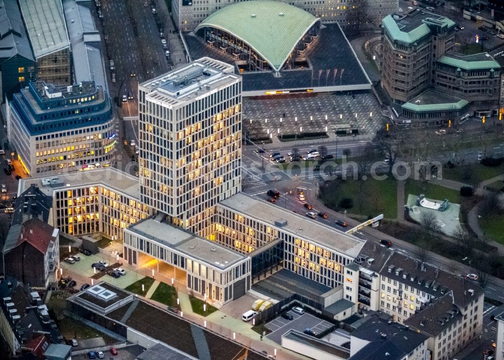 Dortmund at night from the bird perspective: Night Aerial view of skyscraper insurance Hoher Wall of Volkswohlbund Insurance in Dortmund in the Ruhr area in North Rhine-Westphalia