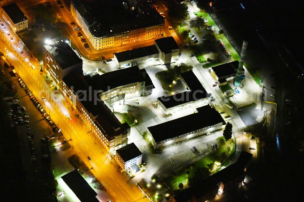 Dresden at night from the bird perspective: Night lighting Building and production halls on the premises of Menarini - Von Heyden GmbH in the district Neustadt in Dresden in the state Saxony, Germany