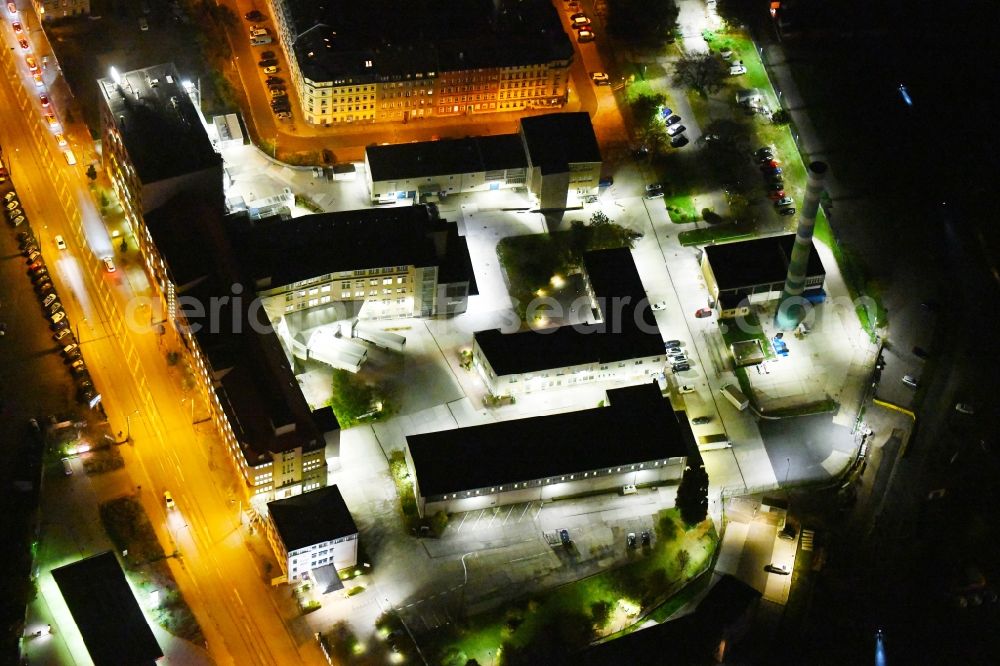 Aerial image at night Dresden - Night lighting Building and production halls on the premises of Menarini - Von Heyden GmbH in the district Neustadt in Dresden in the state Saxony, Germany