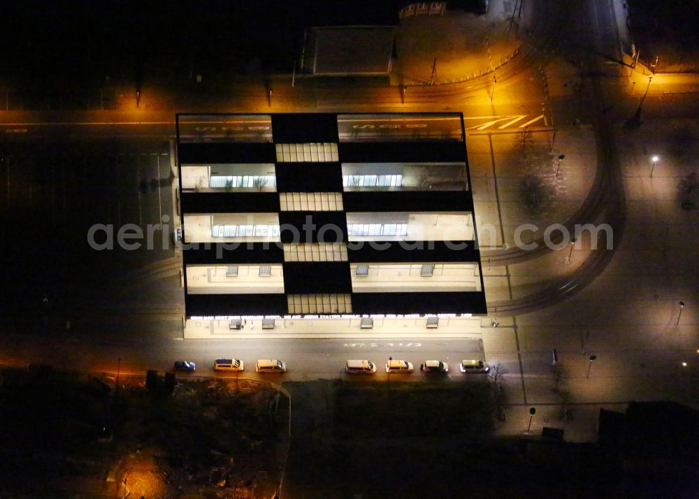 Gotha at night from the bird perspective: Night aerial view of the ZOB omnibus station and the tram stop of the public transport company in Gotha in the state of Thuringia, Germany