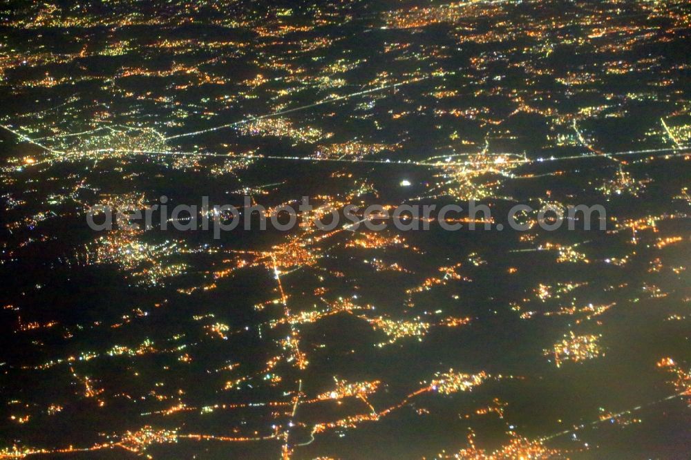 Aerial photograph at night El Ibrahimaia - Night lighting of tne towns and villages in the landscape of the fertil Nile River Delta in the area of El Ibrahimaia in Ash Sharqia Governorate, Egypt