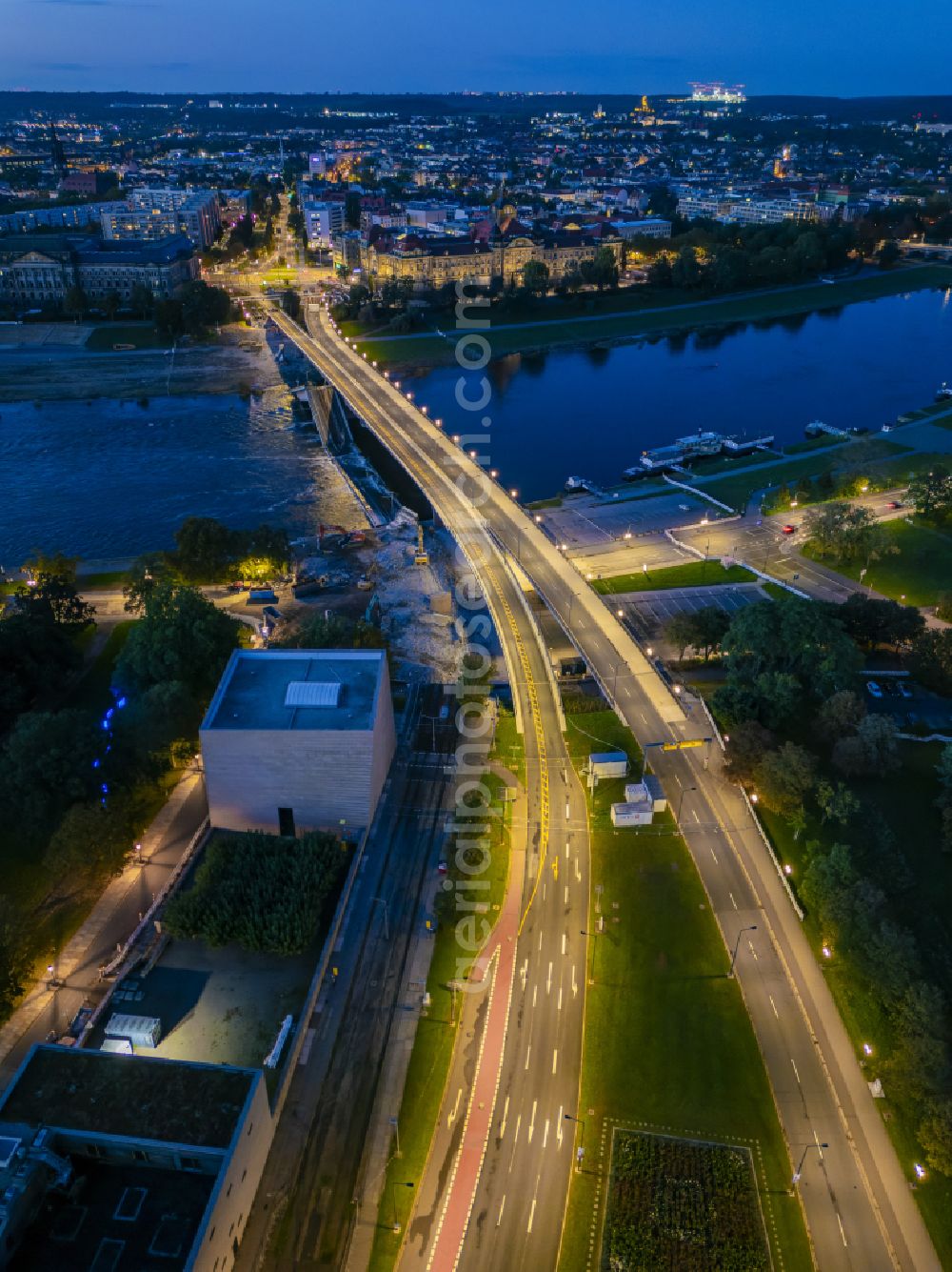 Aerial image at night Dresden - Night lighting concrete segments of the collapsed river bridge structure for crossing the Elbe Carolabruecke on the street Carolabruecke in Dresden in the federal state of Saxony, Germany, have fallen down into the riverbed of the Elbe