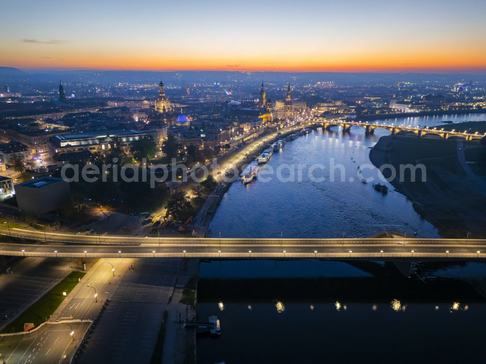 Aerial photograph at night Dresden - Night lighting concrete segments of the collapsed river bridge structure for crossing the Elbe Carolabruecke on the street Carolabruecke in Dresden in the federal state of Saxony, Germany, have fallen down into the riverbed of the Elbe