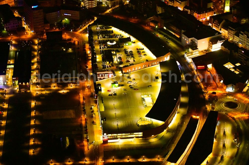 Aerial image at night Gummersbach - Night lighting building of the shopping center Forum Gummersbach in Gummersbach in the state North Rhine-Westphalia, Germany